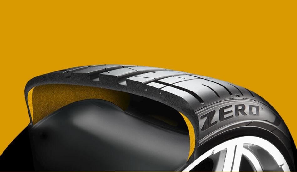 Esta imagem se refere ao pneu pirelli cortado ao meio mostrando a tecnologia da borracha.
