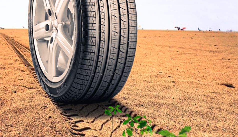 Esta imagem se refere a um pneu verde, um pneu ecologico que lesa menos o meio amniente