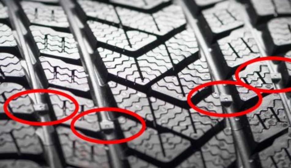 Esta imagem se refere ao twi do pneu, indicador que mostra quando deve o mesmo ser trocado
